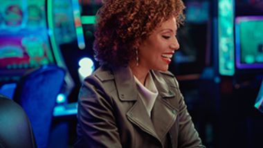 Women playing a slot machine