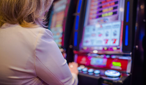 Older woman at slot machine