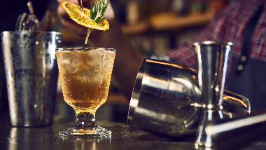 bartender pouring a drink